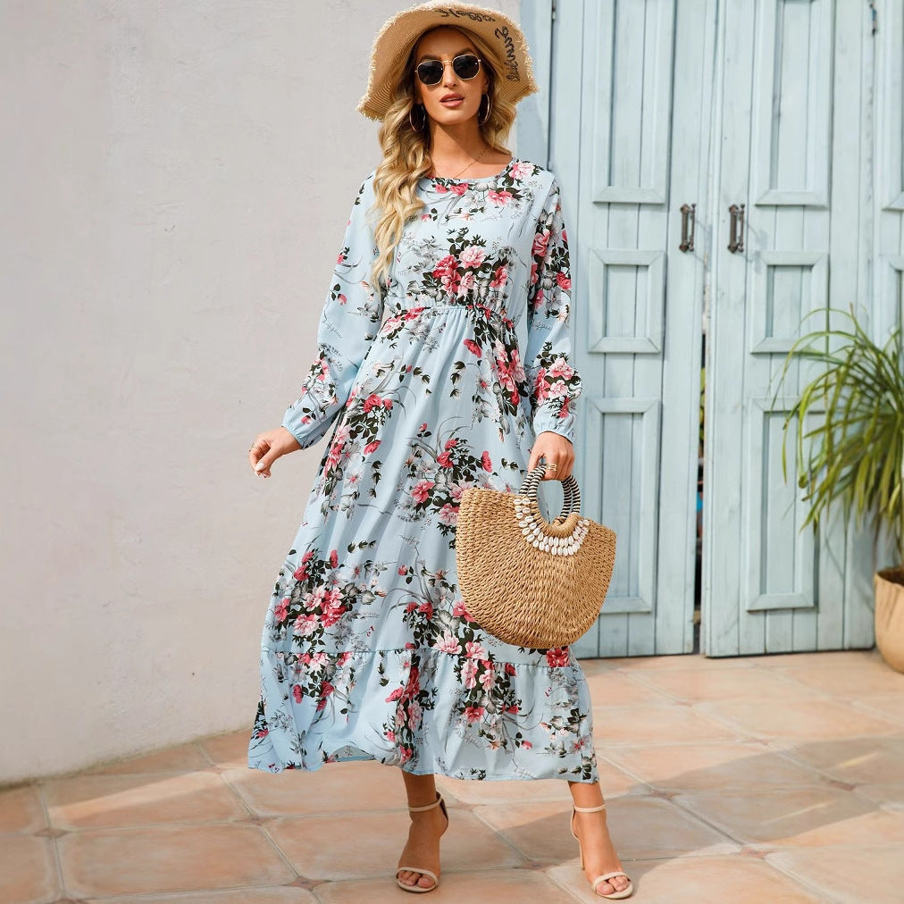 Elegante vestito lungo floreale con silhouette a trapezio e scollo rotondo, moda donna.