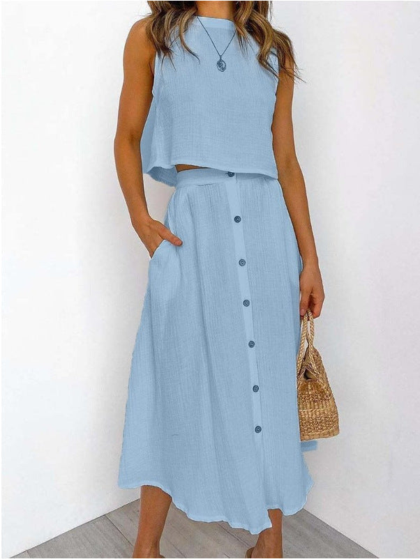 Completo donna primavera: gilet casual e abito midi stampato, ideale per un look coordinato.
