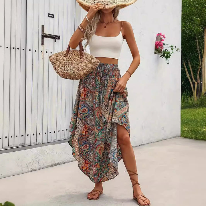 Gonna a linea A femminile con stampa vivace e lacci decorativi, un capo versatile per abbigliamento primavera.