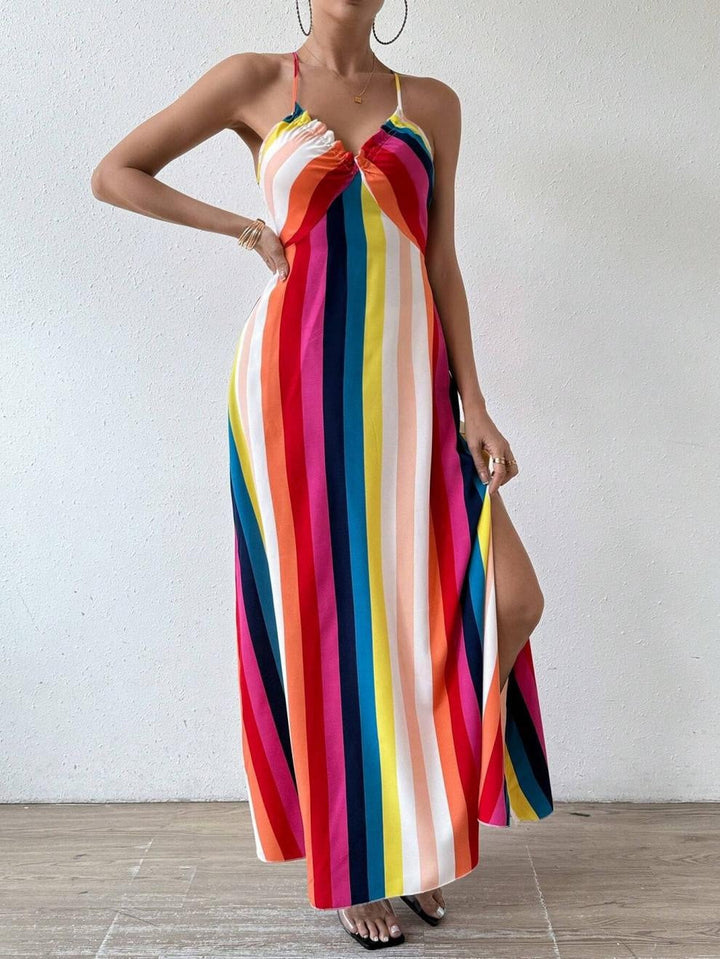 Abito midi donna con vibranti righe arcobaleno, vestibilità bodycon. Ideale per un look estivo e alla moda.