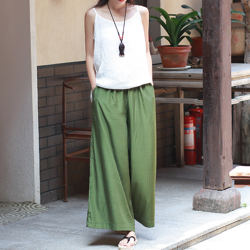 Pantaloni donna a gamba larga fluidi, perfetti per un look sofisticato e rilassato.