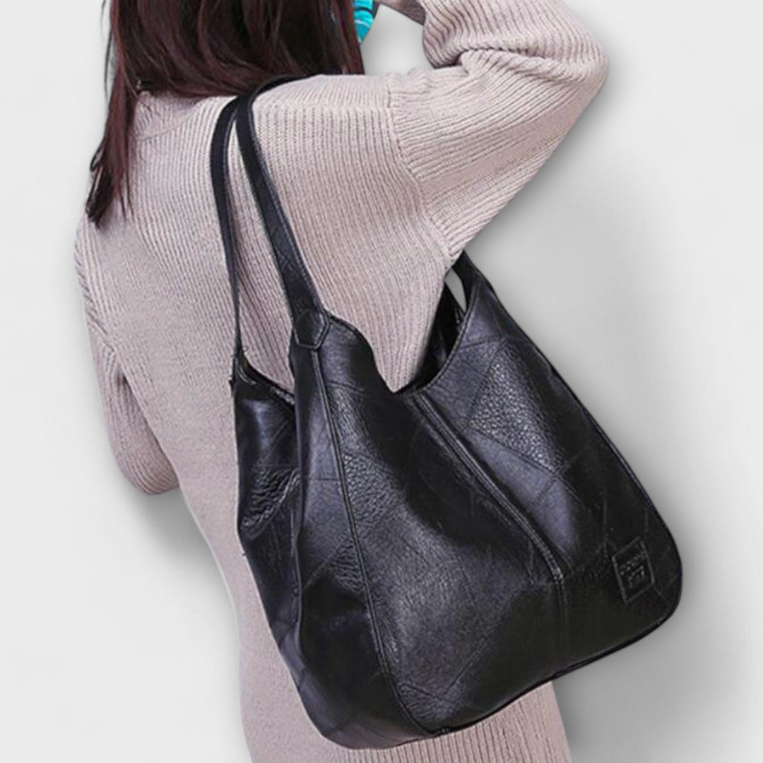 Elegante borsa donna vintage in materiale effetto pelle, versatile per ogni occasione.