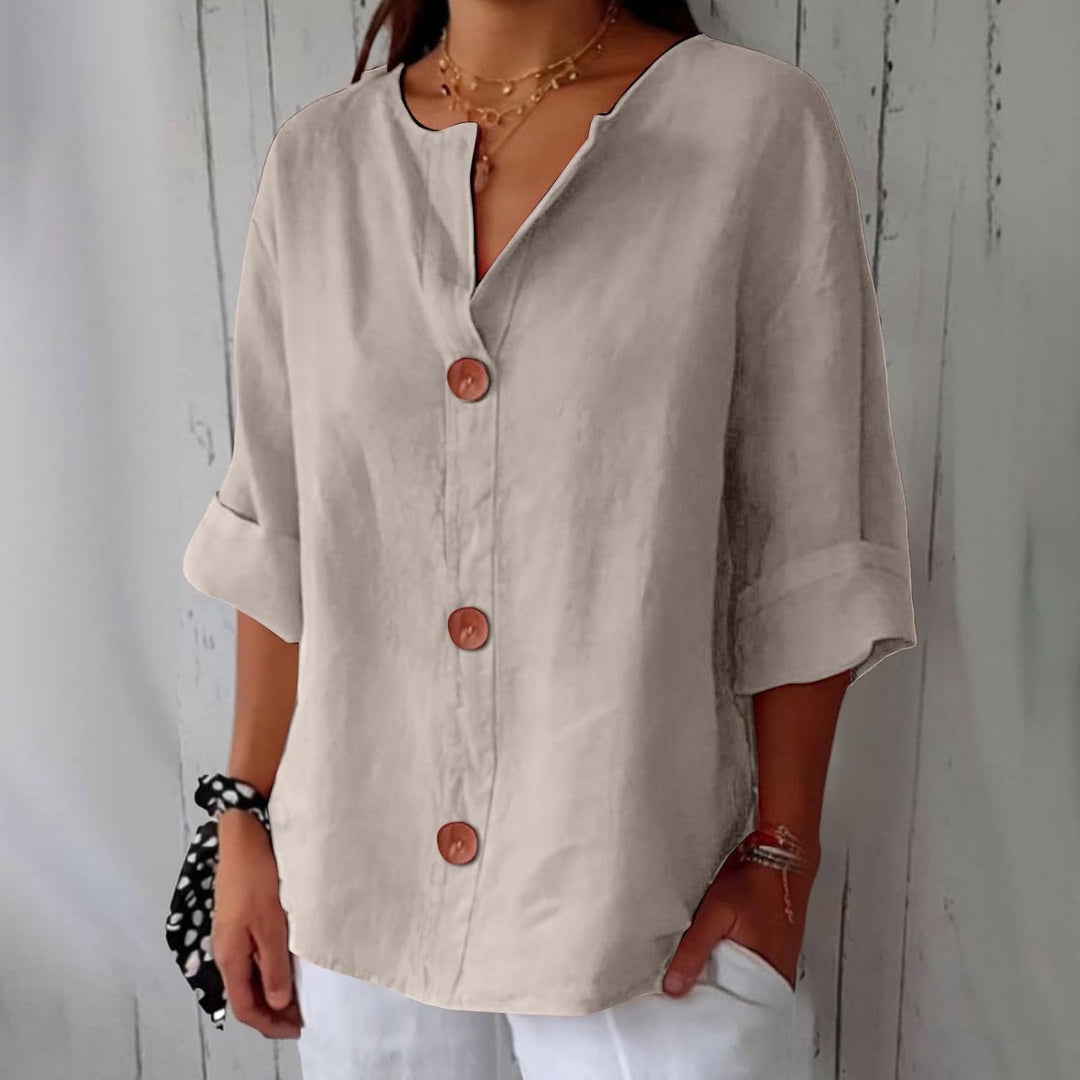Blusa estiva donna in lino traspirante, collo coreana e bottoni, massimo comfort e freschezza.