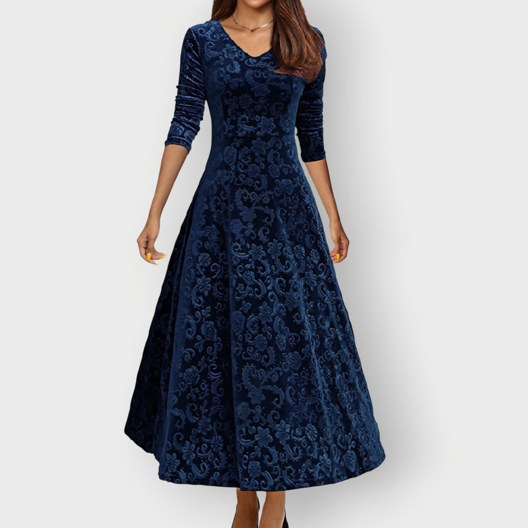 Abito da festa midi donna, stile vintage, scollo a V profondo, design svasato per look sofisticato.