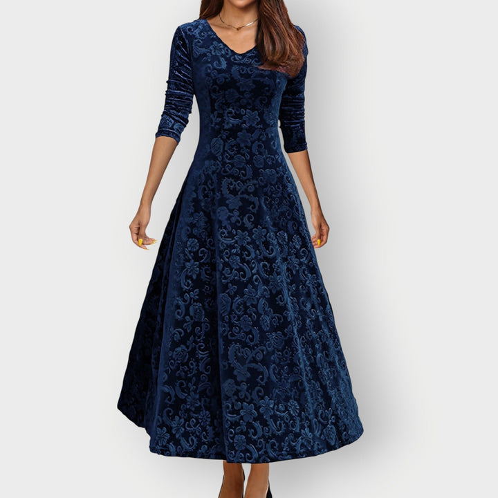 Abito da festa midi donna, stile vintage, scollo a V profondo, design svasato per look sofisticato.
