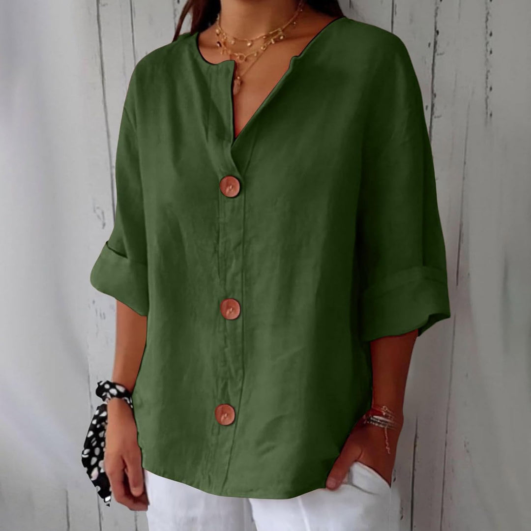 Camicetta di lino rosa per donna, leggera e traspirante, perfetta per un look estivo casual.