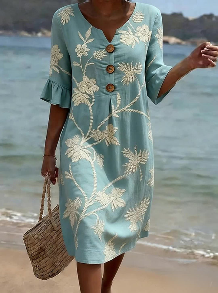 Abito estivo floreale da donna in cotone con maniche 3/4, ideale per un look fresco e casual.