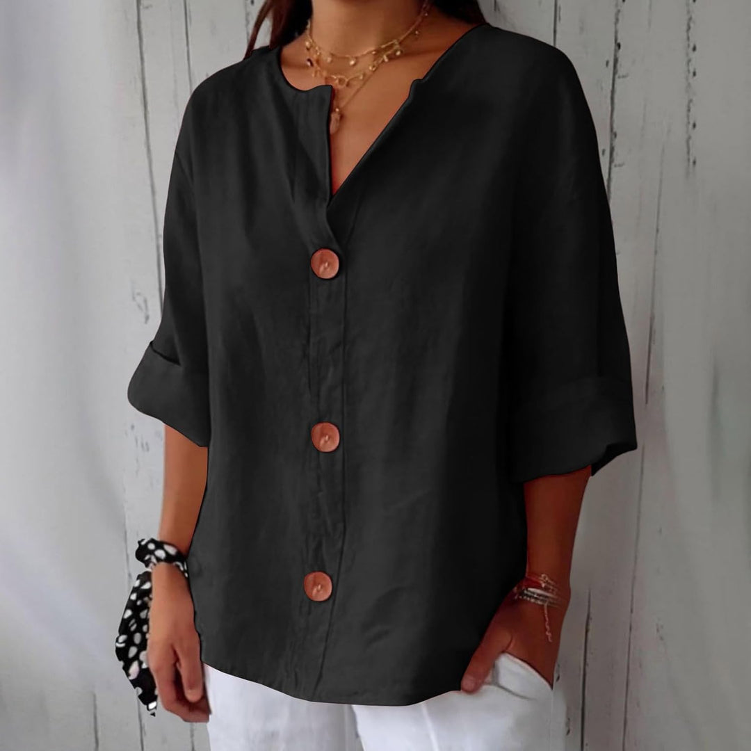 Blusa donna in lino con bottoni frontali e collo alla coreana, un capo essenziale per l'estate.