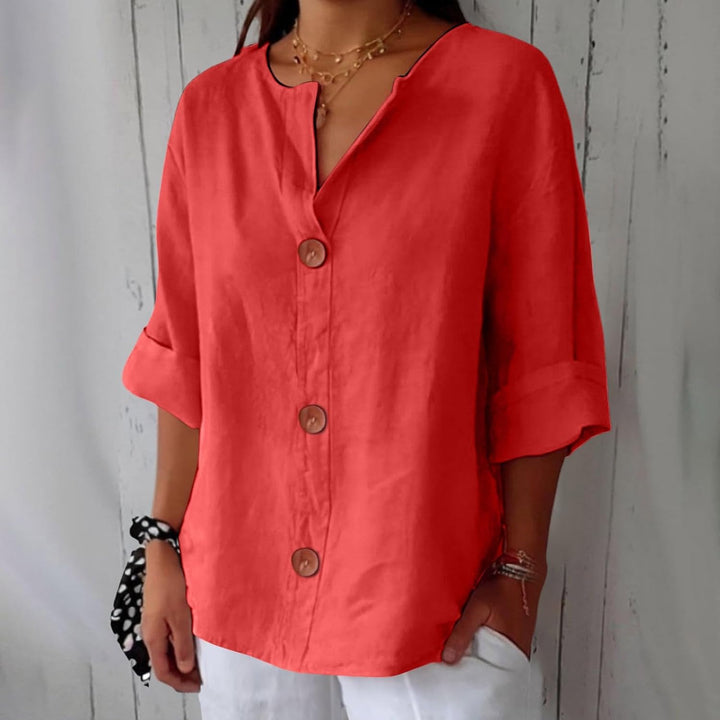 Blusa donna in lino colori assortiti, collo alla coreana e bottoni, per look freschi e vivaci.