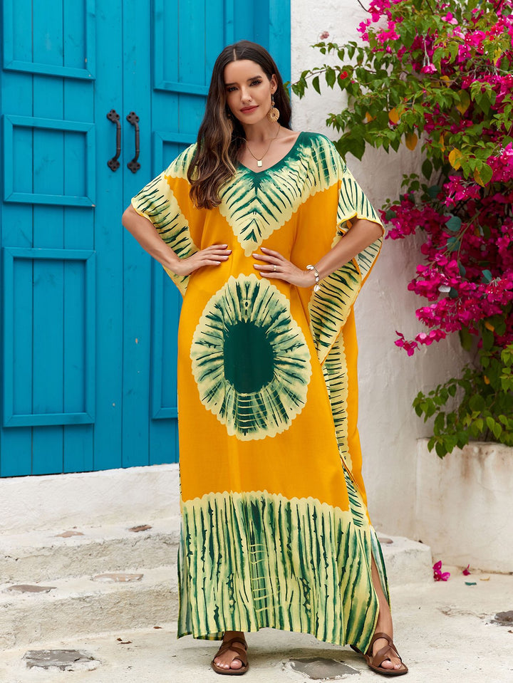 Maxi abito estivo da donna con fantasia delicata, scollo a V, perfetto per un comfort casual.