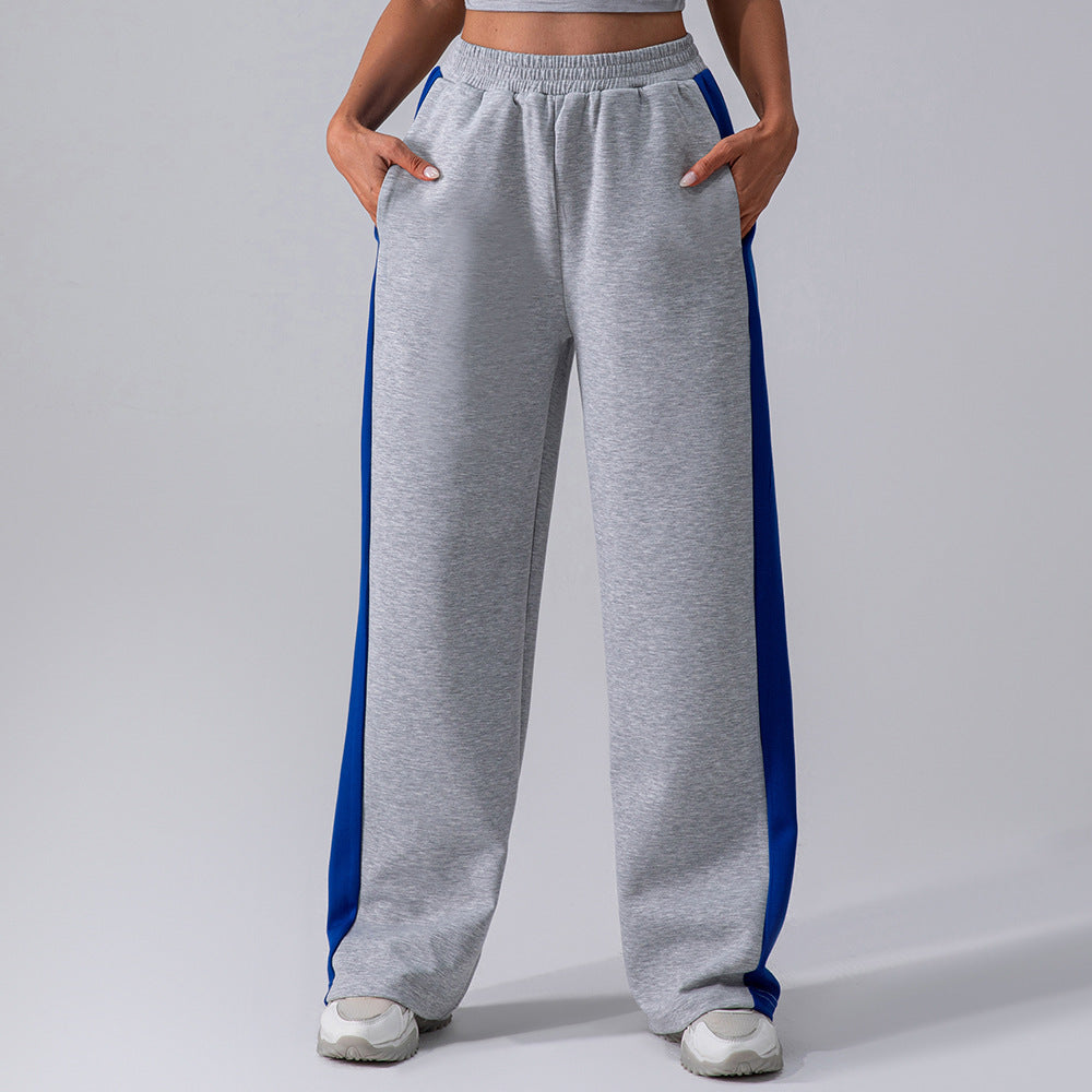 Pantaloni donna a vita alta grigi, gamba dritta, elasticizzati. Ideali per ufficio o look casual elegante.