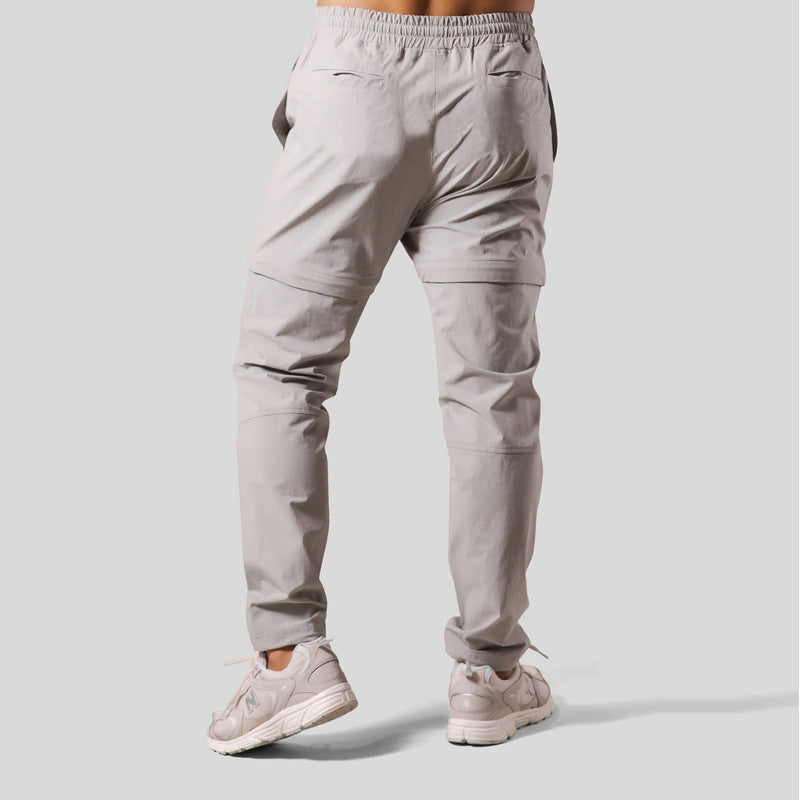 Comodi pantaloni sportivi uomo a gamba dritta con vestibilità ampia, ideali per fitness, tempo libero e attività.