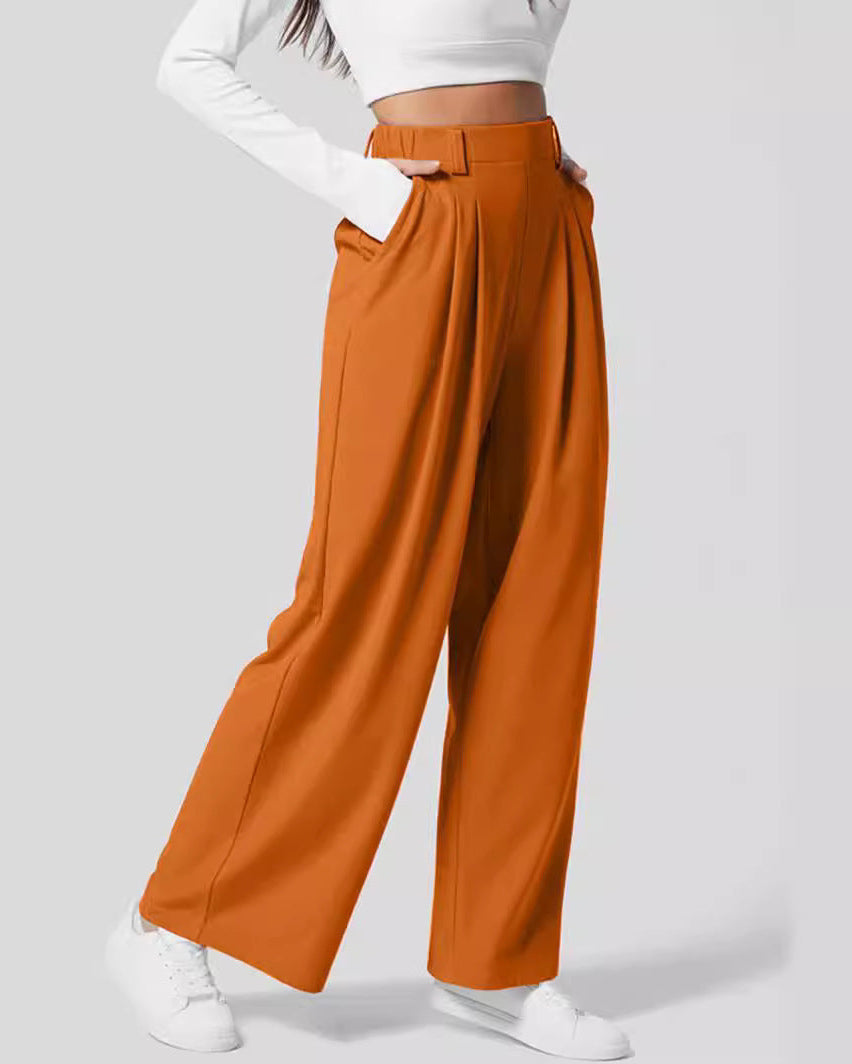 Pantaloni vita alta donna con gamba ampia e trama waffle. Scelta chic per un look rilassato ma sofisticato.