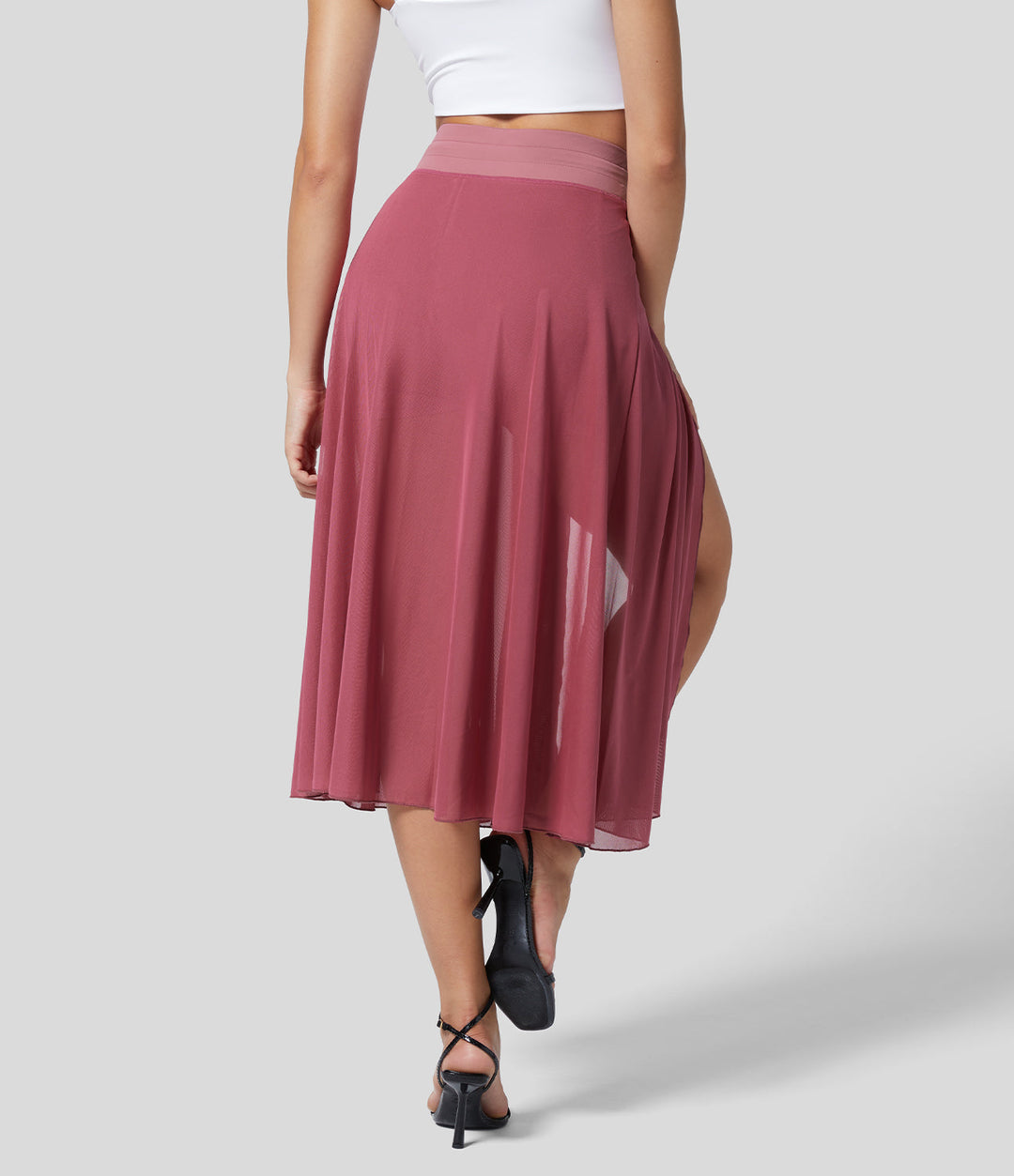 Gonna midi elegante con vita alta e tasca, perfetta per un look sofisticato.