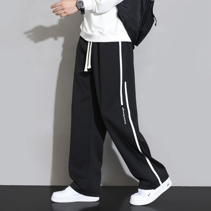 Pantaloni tuta uomo a gamba dritta, grigi, per comfort casual. Perfetti per il relax e il tempo libero.
