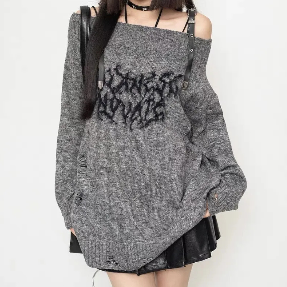 Morbido maglione oversize da donna a collo alto, per un comfort supremo e uno stile sofisticato in ogni occasione.
