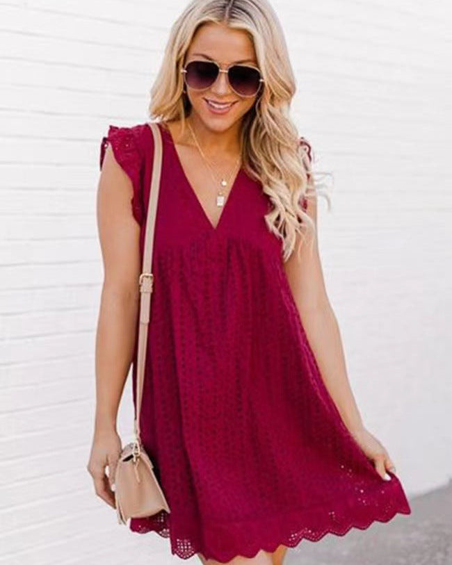 Abito midi donna elegante con scollo a V profondo, in jacquard, senza maniche.