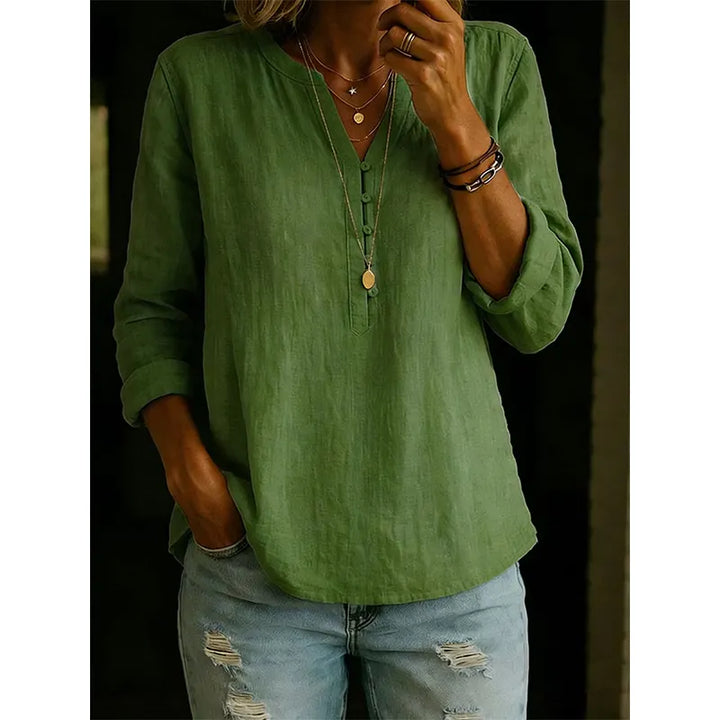 Camicia donna versatile con collo a V, bottoni e maniche arrotolabili. Moda comoda.