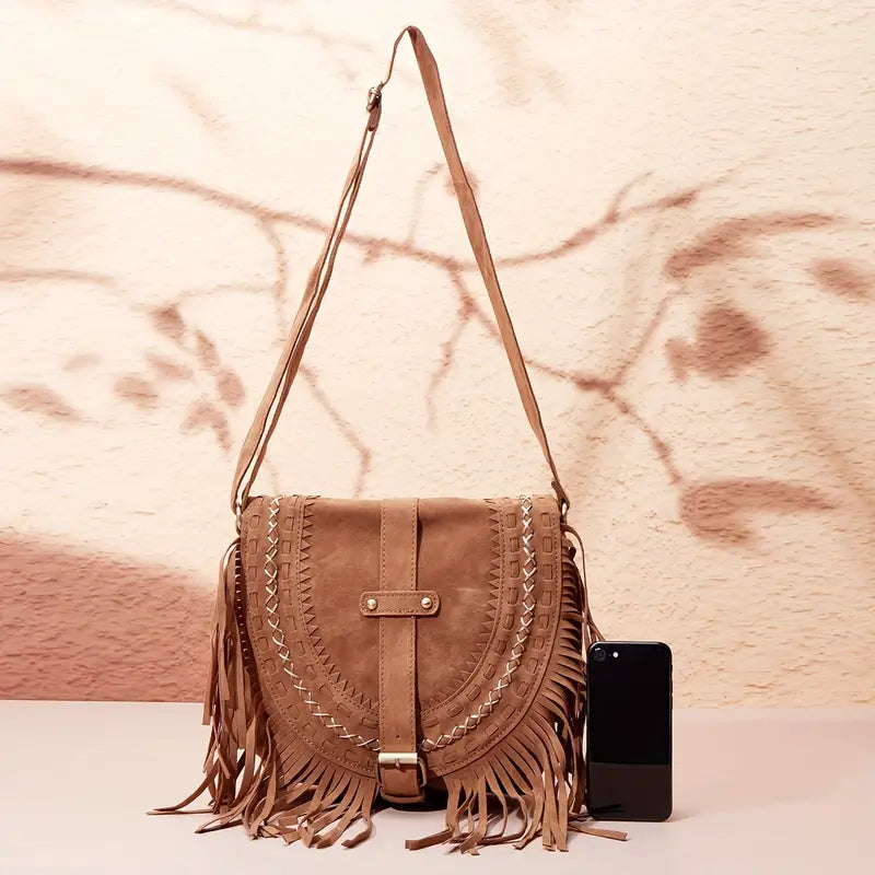 Borsa a tracolla donna elegante con nappina chic. Accessorio versatile per ogni look. Ottima come borsa a spalla.