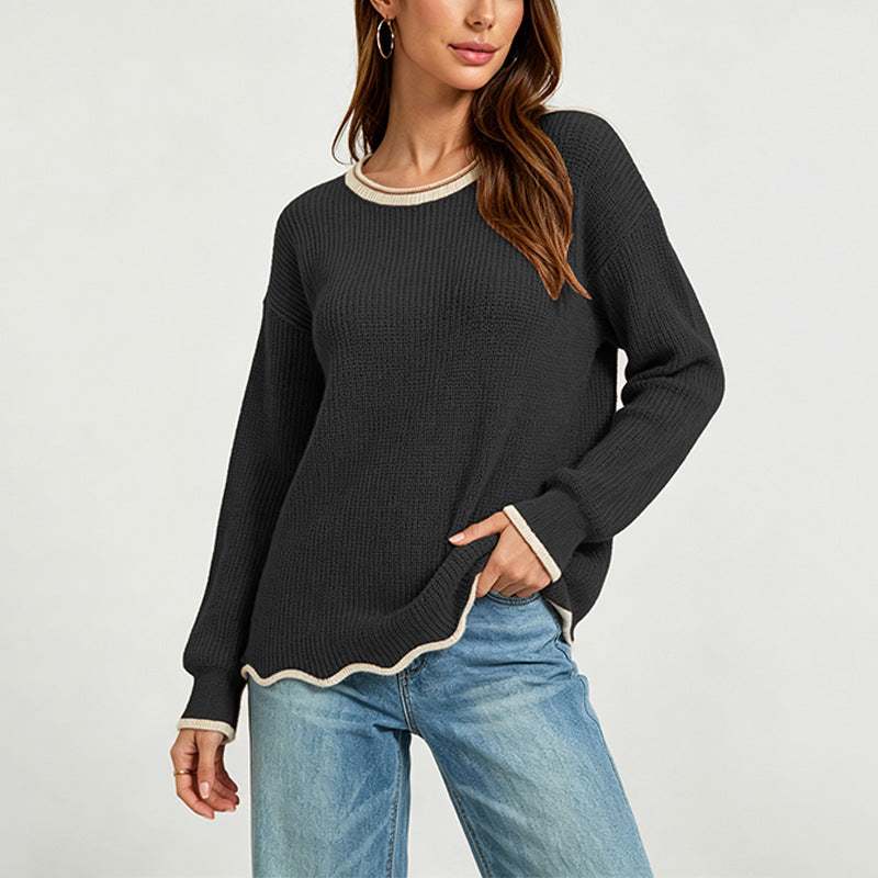 Maglione donna nero ampio a girocollo. Stile casual chic, ideale per l'abbigliamento versatile.