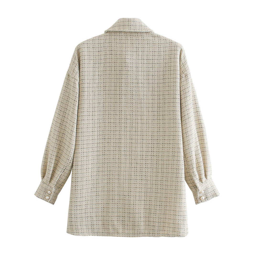 Camicia donna oversize a quadri con manica lunga, perfetta per l'abbigliamento autunnale. Stile casual ed elegante.