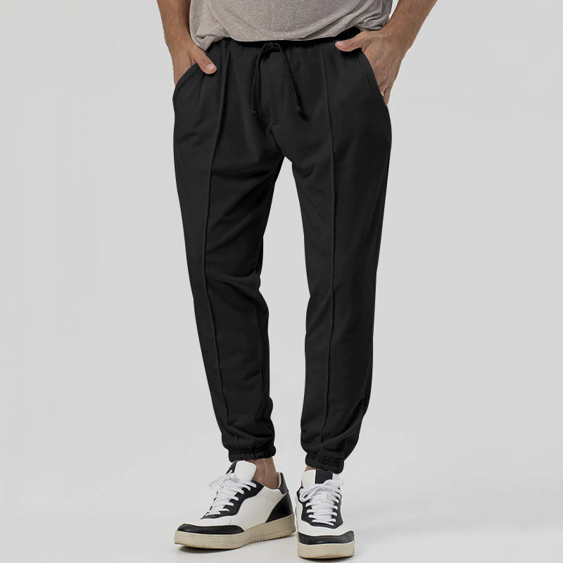 Pantaloni tuta uomo tapered, vita media, gamba affusolata, comfort streetwear per il tuo stile.
