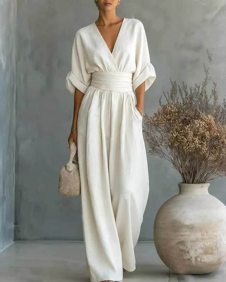 Tuta elegante femminile, vita alta e scollo a V, per un outfit slim e sofisticato. Perfetta per apparire al meglio.