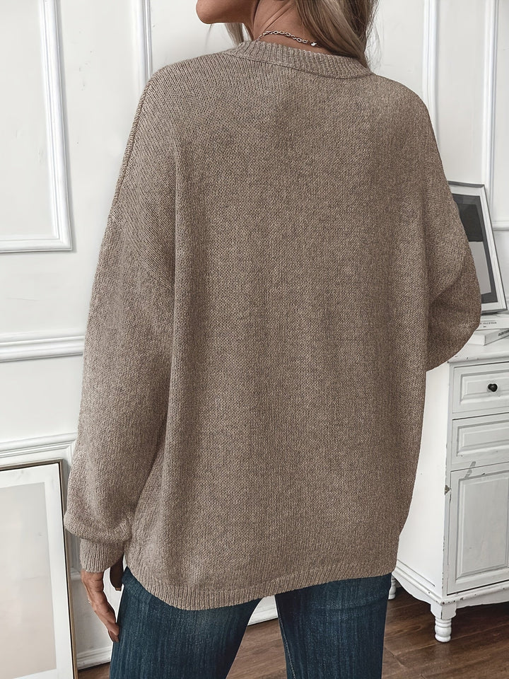 Comodo maglione donna girocollo grigio, maniche lunghe. Abbigliamento versatile, perfetto per autunno e inverno.