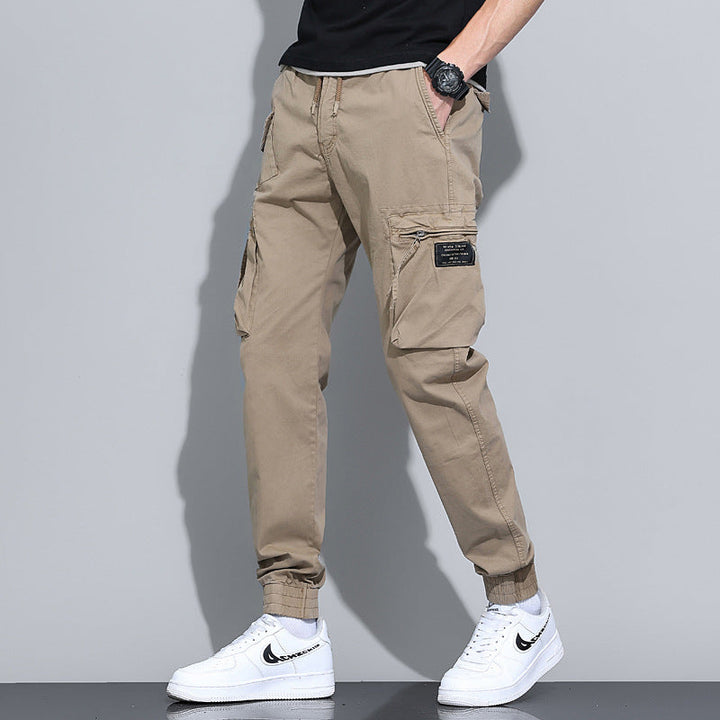 Pantaloni cargo uomo casual, gamba larga e laccetto, ideali per un look comodo e di tendenza.