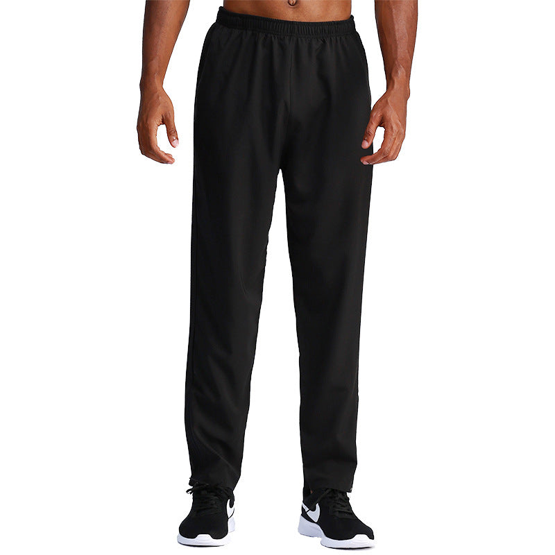 Pantaloni sportivi ampi da uomo, comodi e casual per basket, fitness o relax. Tecnologia ad asciugatura rapida.