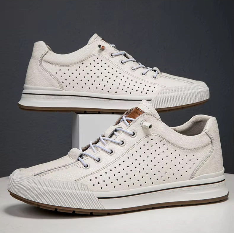 Sneakers moda uomo/donna, design versatile bianco e nero, leggerezza e comfort per l'eleganza di ogni giorno.