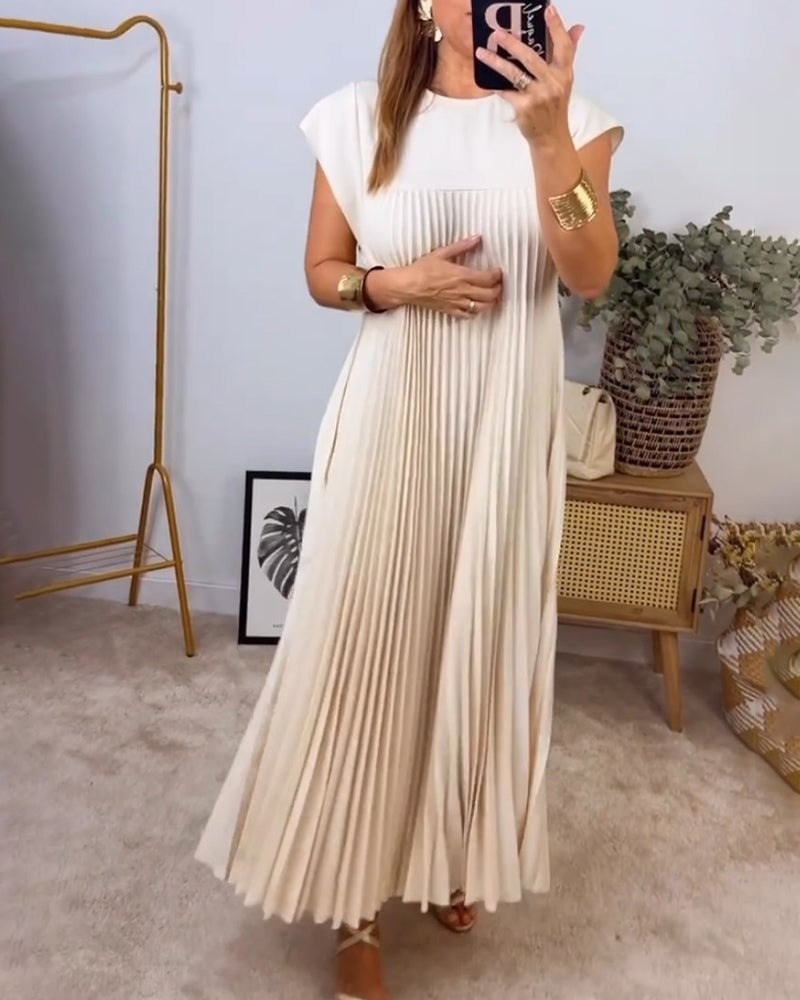 Abito plissettato maxi da donna, tessuto fluido e raffinato, perfetto per un look estivo elegante.