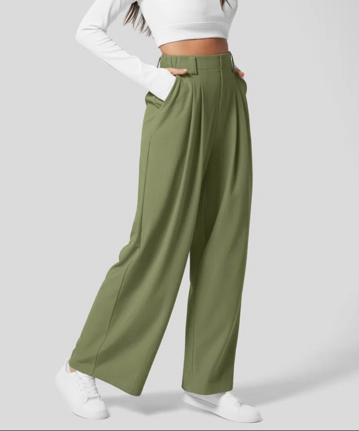 Moda donna: pantaloni vita alta gamba larga, stile elegante e moderno per un look femminile e sofisticato.
