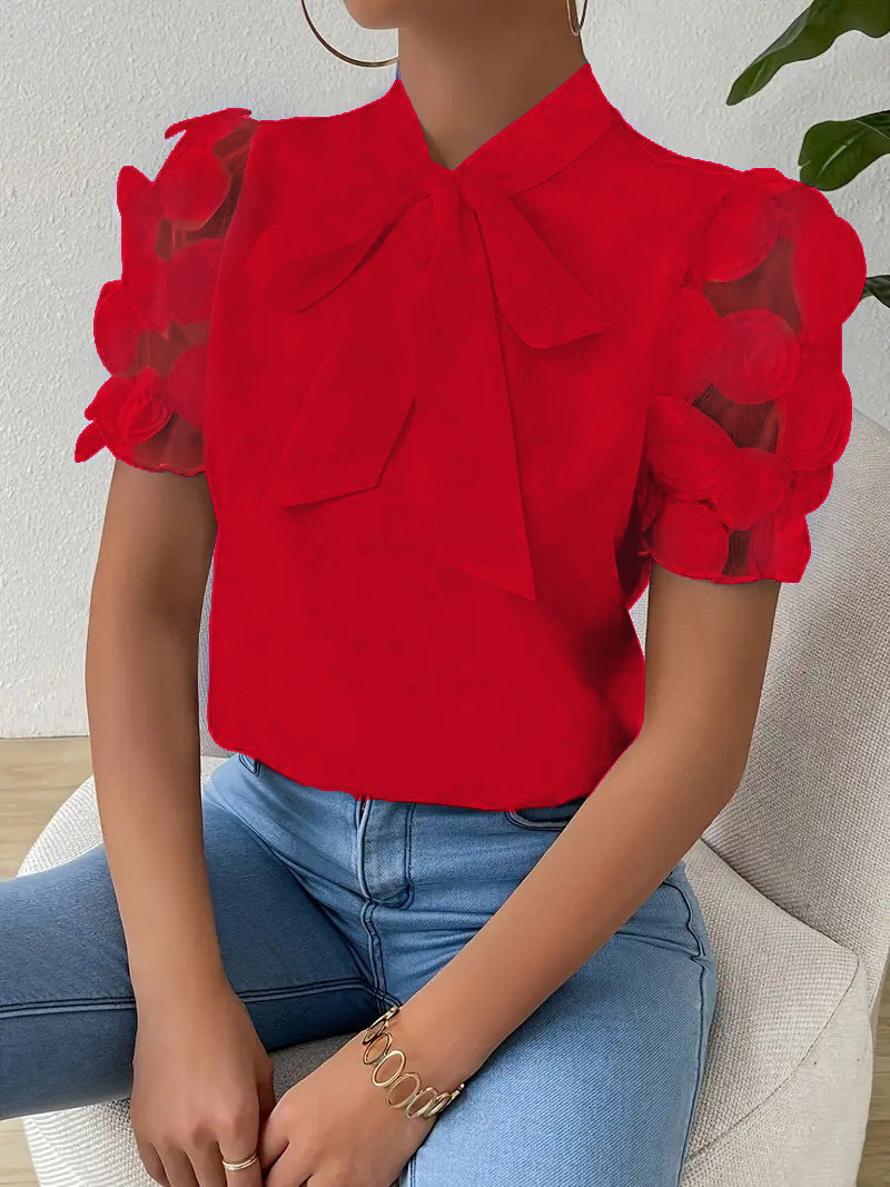 Blusa elegante da donna con fiocco, ideale per ufficio o occasioni speciali. Stile chic e raffinato, look versatile.
