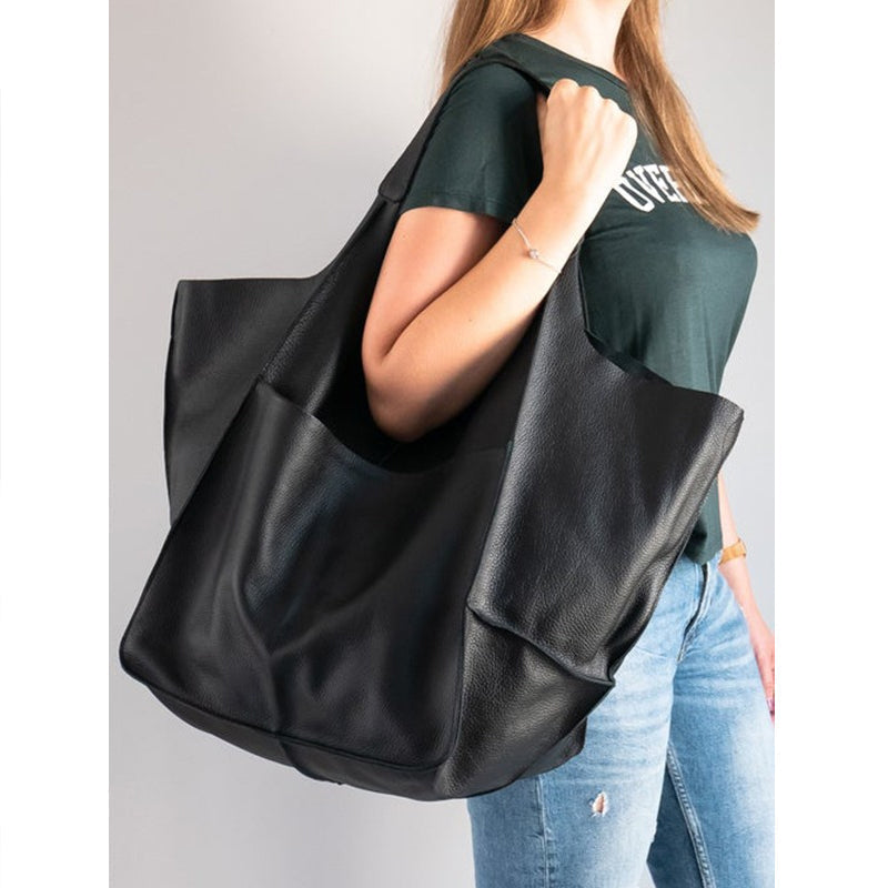 Borsa a tracolla vintage donna, versatile per un look casual o più formale.