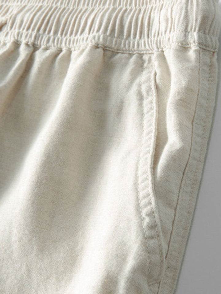 Pantaloni in lino uomo del completo estivo, taglio dritto e vita elasticizzata, comodi e freschi.