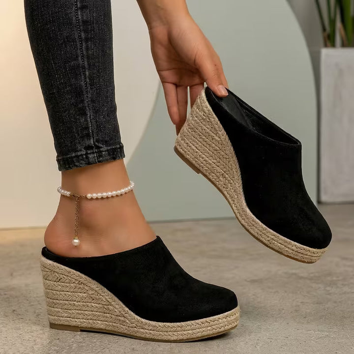 Sandali donna con zeppa comoda, ideali per l'estate. Calzature eleganti e casual in colori moda.