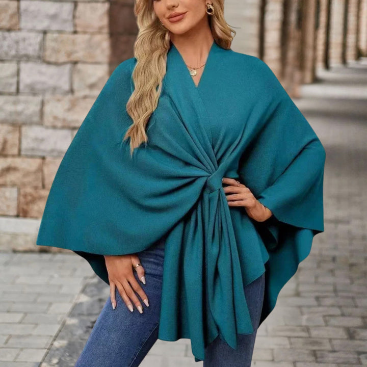 Poncho moda donna, elegante e chic, con fiocco. Un capo comodo e versatile per il tuo guardaroba.