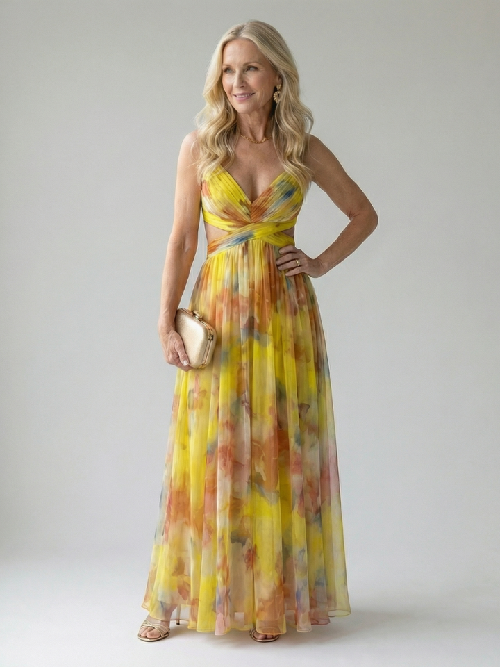 Maxi abito leggero da donna, design incrociato e tessuto fluido. Un must per la moda estiva casual.