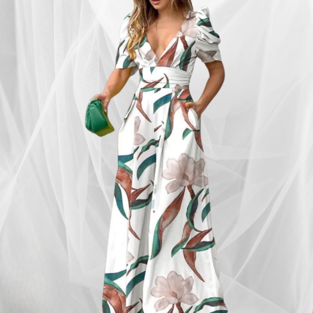 Vestito estivo donna stampato blu, scollo a V, vestibilità comoda, ideale per spiaggia e look casual elegante.