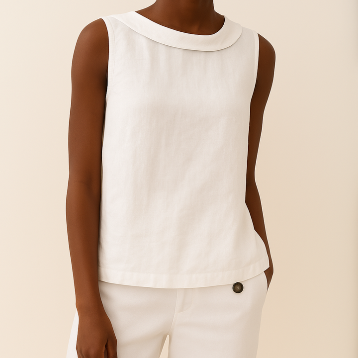 Blusa donna casual elegante, senza maniche e con collo alto, perfetta per giornate calde e serate chic.