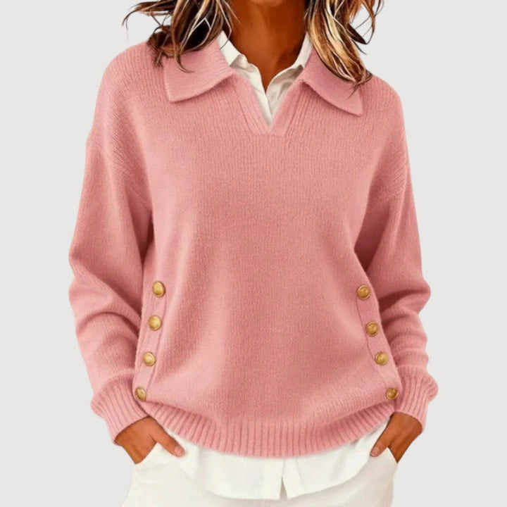 Maglione donna elegante con collo a bottoni e maniche lunghe. Un capo essenziale per la moda autunno-inverno.