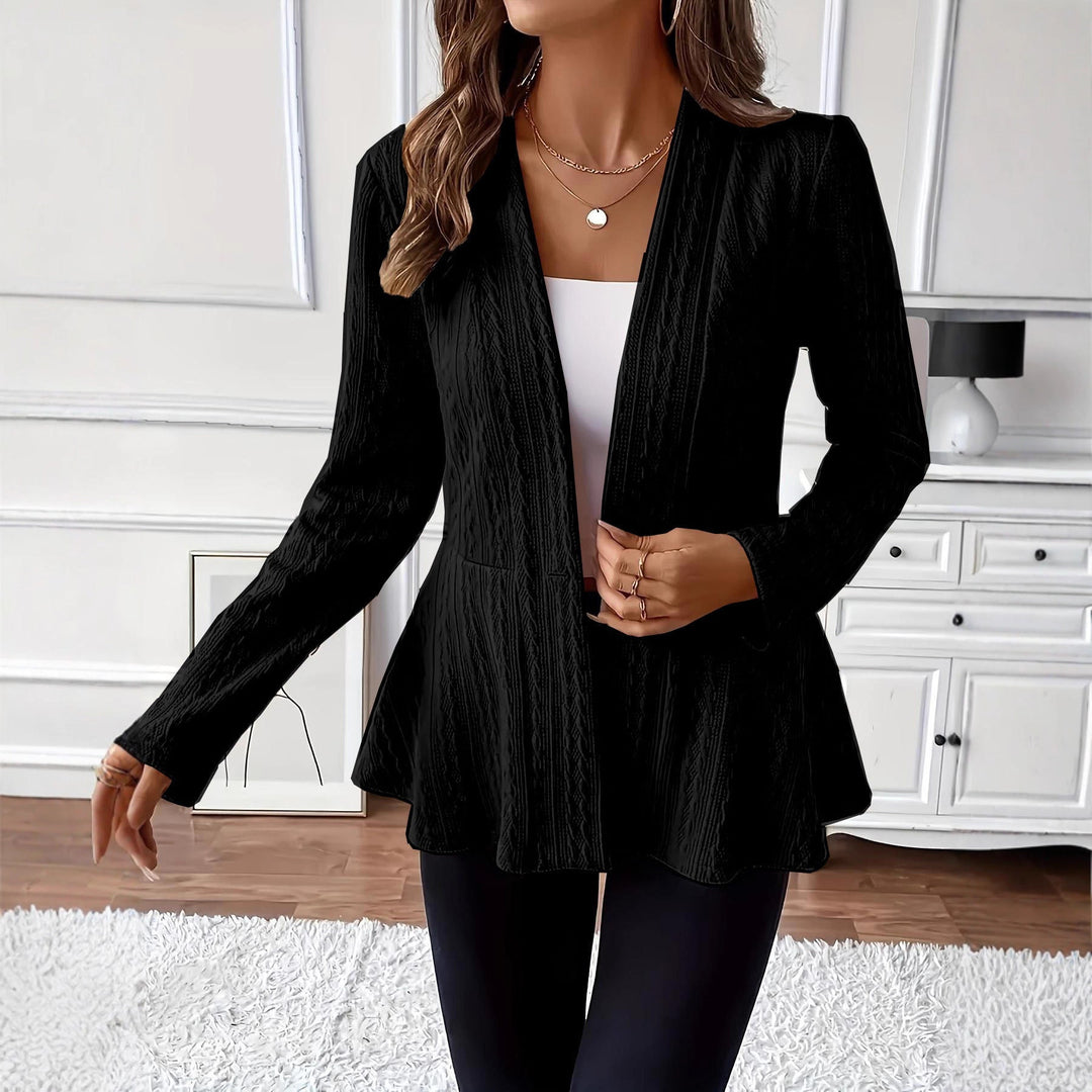 Cardigan donna con bottone, maniche lunghe, tinta unita. Abbigliamento comodo ed elegante per un look versatile.