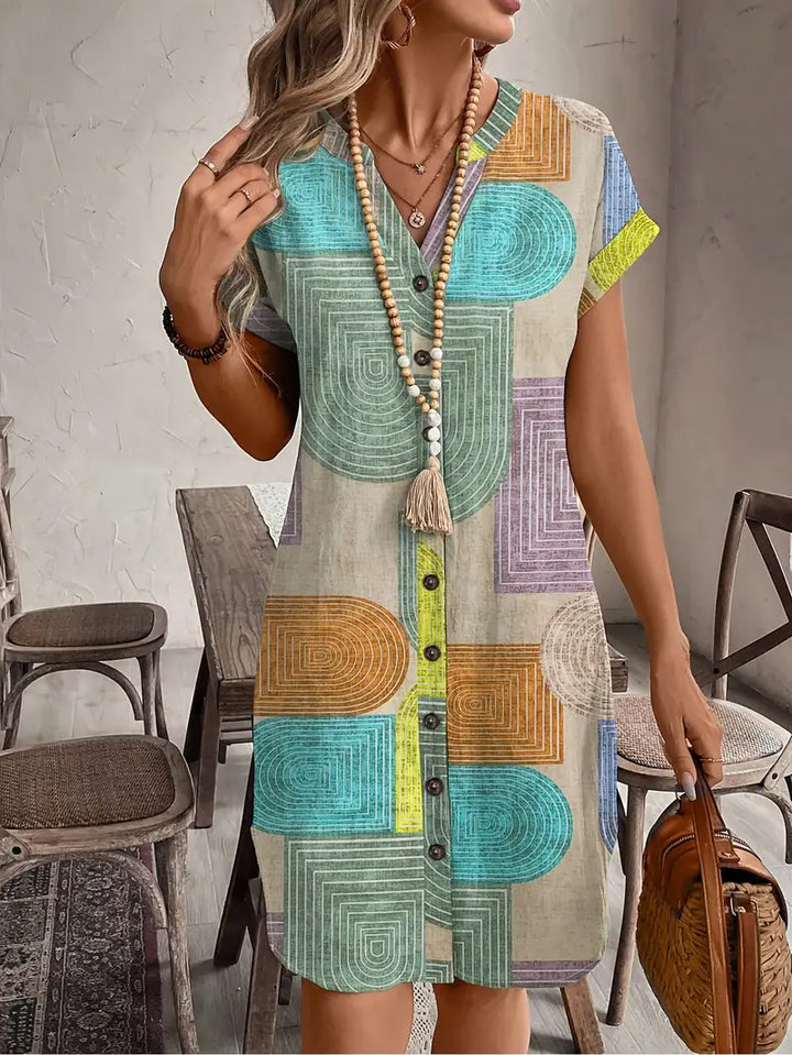 Abito geometrico da donna elegante, perfetto per stile versatile. Vestito chic primaverile/estivo.
