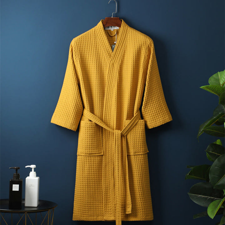 Accappatoio unisex in cotone a coste per il massimo comfort e relax dopo il bagno.