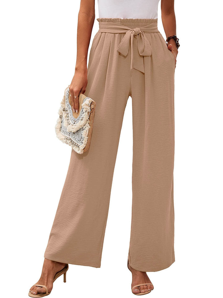 Nodo in vita su pantaloni donna eleganti a gamba ampia. Stile sofisticato e casual.