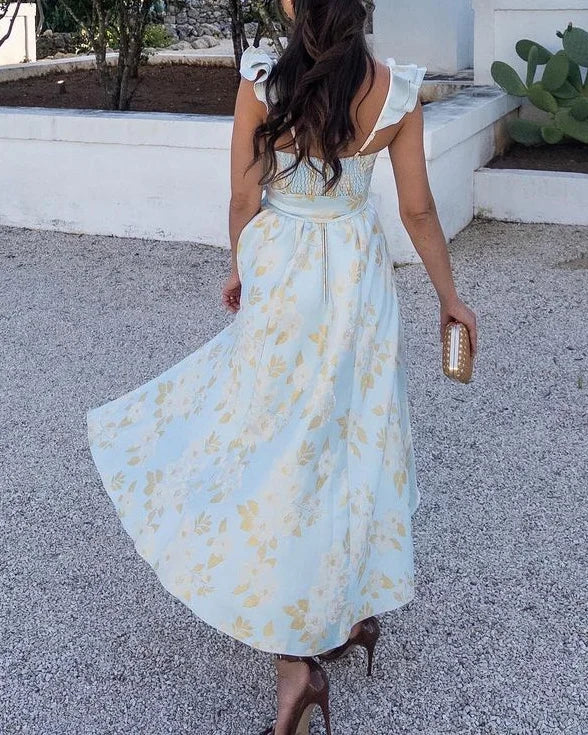 Abito da cocktail midi donna, con dettaglio fiocco e spalline arricciate. Moda estiva versatile per ogni occasione.