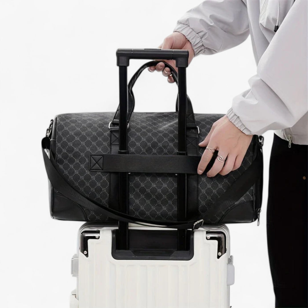 Elegante borsone da viaggio unisex con motivo foglie. Multiscomparto per un bagaglio sempre organizzato e sicuro.