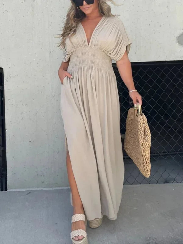 Abito lungo elegante donna crema, scollo a V, spacco. Stile moderno per serate e eventi estivi.