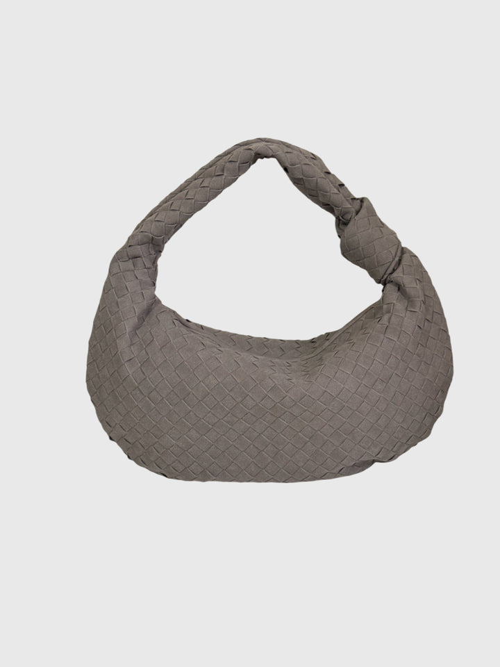 Borsa tracolla da donna in suede intrecciato, design elegante e nodo frontale.
